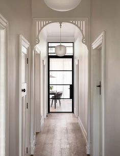 the hallway is clean and ready for us to use as an entrance way in this home