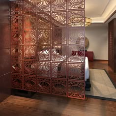 the room divider is made out of wood and has an intricate design on it