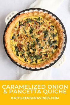 a quiche with spinach and cheese in a cast iron pan on a white table