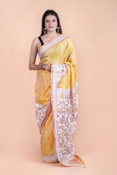 "Light orange gold Hand Embroidered reverse Kantha Stitch Saree with Blouse piece | Blended Bangalore Silk Saree | Kantha Hand Work / Party Wedding Wear / off white base multicolor thread work kantha saree Wedding wear saree, party wear saree, Blended Banglore silk saree, hand embroidered saree, hand work saree. This is authentic hand embroidered Kantha Stitch Saree. The unique thread Kantha embroidery design is entirely handcrafted by our skilled artisans. The most significant aspect of hand em Gold Slub Silk Traditional Wear With Chikankari Embroidery, Gold Chikankari Embroidery Slub Silk Traditional Wear, Orange Blouse Piece For Puja During Navratri, Embroidered Yellow Slub Silk Traditional Wear, Orange Cotton Silk Traditional Wear For Wedding, Orange Cotton Silk Dupatta With Cutdana, Yellow Saree With Cutdana Embroidery, Orange Cotton Silk Dupatta For Navratri, Orange Chanderi Pre-draped Saree For Navratri