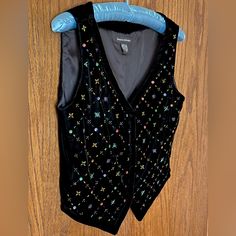 Fun Black Velvet Vest With Multi-Colored Beads. Snap Button Closures. Never Worn. Stored Under Cover. Beautiful For A Party, Holiday Or Special Occasion. The Length Is About 20 Inches From The Shoulder. Slim Fit. Velvet Vest, Womens Vest, Vintage Tops, Black Velvet, Banana Republic, Special Occasion, Velvet, Slim Fit, Womens Tops