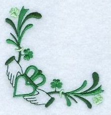 the embroidery design is done in green and white