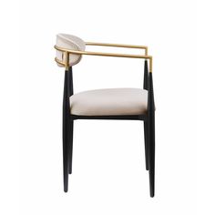 a chair with a gold frame and white upholstered cushion on the armrest