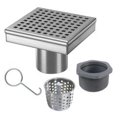 a stainless steel shower drain with strainer and grate for cleaning the bathroom sink