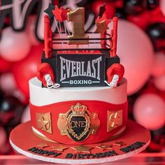 a red and white boxing themed birthday cake