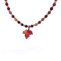 Lovely blend of Red Creek Jasper beads with Mystic Rainbow Moonstones. The maple leaf pendant is a Patricia Healy creation. This can be worn as a choker or necklace with the length of 15 1/2”-18 1/2” with the 14k GF lobster clasp and extender chain. These gemstones have been a very popular choice in our shop and is loved for its beautiful colors of green, orange, beige, red and brown. These are natural gemstones, the best quality available. Red Creek Jasper, Red And Brown, Jasper Beads, Leaf Necklace, Leaf Pendant, Moon Stone, Green Orange, Rainbow Moonstone, Maple Leaf