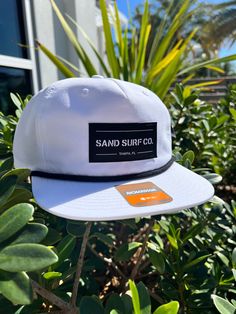 Stay Sandy with the Sand Surf Co. Richardson Patch Logo Hat! Flip-up buckram and a 5mm rope give this cap a unique look that’s sure to turn heads both up and down stream. Perfect for backpacking, trail-running, or day hiking. UPF RATING: 50+ SHAPE Flip-Up Stay Pinch FABRIC Cotton/Nylon VISOR Flat SWEATBAND Cotton MATERIAL 85% Cotton, 15% Nylon CONSTRUCTION Woven Adjustable SnapbackOSFM (7 – 7 3/4) Freestyle Watch, Richardson Hats, Surf Hats, Orange Hat, Day Hiking, Fall Style Guide, Womens Hats, Sup Accessories, Sand Surfing