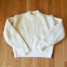 Super Cute Creamy White Sweater! New With Tags! Very Warm And Cozy Alpaca Wool Blend. Ribbed Mock Neck, Hem, And Cuffs, Long Sleeves. Nwt Size Large, Great Oversize Sweater For Smaller Sizes Too! Measurements (Approx) Pit To Pit: 23" Length: 23" Winter, Fall, Autumn, Cream, Neutral, Academia, Cottagecore, Cottage Core, Grandma, Cable Knit, Turtleneck, Box, Boxy, Balloon, Off White, Fuzzy Reposhing This Item I Purchased From @Tvaughan1. Loved It, But Ready To Rotate For Something New. Questions? H&m White Winter Sweater, Cottage Core Grandma, Flannel Outfits Men, Oversized Red Sweater, Cable Knit Turtleneck, Flannel Outfits, Cottagecore Cottage, Oversize Sweater, Cream Knit Sweater