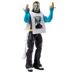 the action figure is holding his hands up and wearing a t - shirt with an image on it