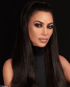 Sexy smolder: Kim went to the dark side with her eye makeup as she promoted the collection which will be available on November 23 Kim K Makeup, Estilo Kim Kardashian, Kim Kardashian Hair, Black Eye Makeup, Kardashian Hair, Dark Eye Makeup, Robert Kardashian