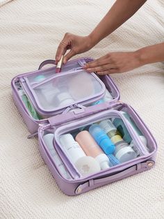 • Features dual carrying handles for easy transport.• Equipped with 2 spacious zippered compartments for ample storage.• Includes a mesh interior zippered pocket for organizing small items. Durable, water-resistant, and lightweight, our clear cosmetic case is self-care approved and designed to meet all your beauty needs. With two spacious and clear compartments, you won't forget a thing as everything is clearly visible. Plus, the top handle makes it a go-to beauty bag for travel, easily flattening to fit perfectly in your luggage or duffel bag. Dimensions: 11.25" x 9" x 5.75" | CALPAK Large Clear Cosmetics Case in Lemon Clear Cosmetic Case, Lavender Jewellery, Clear Cosmetic Bag, Large Makeup Bag, Bag For Travel, Water Bottle Holders, Small Organization, Insulated Lunch Bags, Beauty Bag