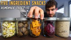 five ingredient snacks in jars on a table