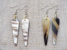 This beautiful earrings pair is handcrafted 100% from natural buffalo horn material. Dimension of horn piece: 5.8 x 1.5 cm. Finish: polish. Metal Parts: stainless steel L306. Each piece of natural horn has its own color variation which make it unique. We will send a color similar to this item or similar to your choice. If you want please just request for a photo before shipping to make sure you can receive exactly the one you like, your satisfaction is our happiness. Have a happy shopping time! Horn, Buffalo, The One, Vietnam, Horn Earrings, Beautiful Earrings, Happy Shopping, Color Variations, A Photo