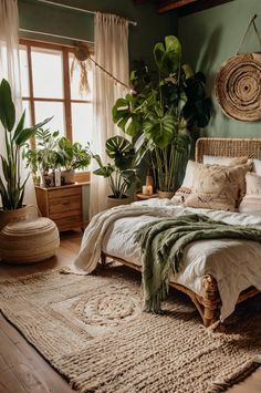 a bedroom with green walls and plants in the corner