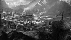 a black and white photo of an industrial area with mountains in the backgroud