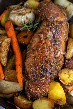 a close up of meat and vegetables in a pan