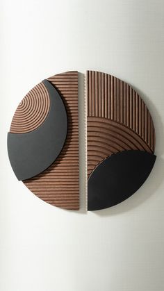 two circular pieces of wood on the wall