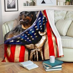 a dog is wrapped in an american flag blanket