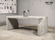 a table made out of concrete with a wine bottle on it and a cork in the middle