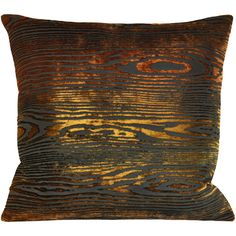 an orange and black pillow with wood grain pattern