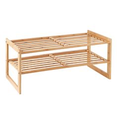 a wooden bed frame sitting on top of a white floor