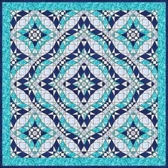 a blue and white quilt with an intricate design