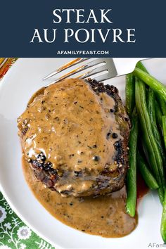 steak with gravy and green beans on a white plate, with text overlay