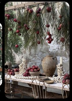 the table is covered with ornaments and fruit