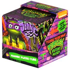 a purple and green box with an image of a teenage mutant ninja turtle on it