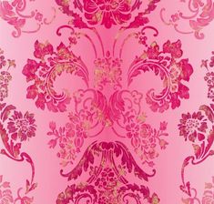 a pink and gold wallpaper with an ornate design