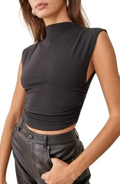 Stretch-hinted organic cotton offers exceptional comfort in this ruched crop top with an elegant mock neckline. 19" length (size Medium) Mock neck Sleeveless 88% organic cotton, 12% spandex Machine wash, tumble dry Imported High Neck Sleeveless Top, Compression Tank Top, Turtleneck Tank Top, Chaleco Casual, Sleeveless Turtleneck, High Neck Sleeveless, Looks Street Style, Cropped Tops, Mode Inspo