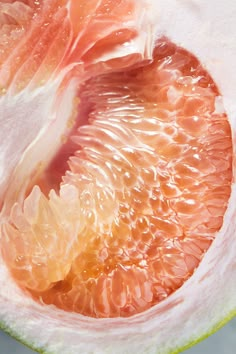 the inside of a grapefruit cut in half