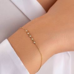 ✦ Diamond Bezel Bracelet ✦  ✧ DESCRIPTION & DETAILS Add a touch of sparkle to any look with this 14k gold bezel setting diamond bracelet.  This elegant bracelet is versatile enough to wear every day, and its dainty design makes it the perfect gift for a loved one. * 14k Solid Gold / 585 stamp * Adjustable length options. * Handmade Item. * Carat Weight of each diamond: 0.013ct / 1.5mm * Bezel Dimensions: 2.70mm * Diamonds: SI1+ Clarity, F-G color * Chain Width: 1.10mm  * Duties and Taxes Included for Orders from the US and the EU ✧ MATERIALS - 14k Solid Gold  Solid gold pieces are made to last forever. Since gold is one of the least reactive metals, it scratches less and doesn't wear out as easily. 14k will not oxidize or discolor, so you can wear your jewelry every day, everywhere. - Diam 14k Gold Bracelet With Bezel Setting For Anniversary, Dainty Diamond Bracelet With Bezel Setting For Anniversary, Gold Diamond Bracelet With Bezel Setting In 14k Gold, 14k Gold Bezel Set Tennis Bracelet As Gift, Delicate Gold Bracelets With Bezel Setting, Dainty Diamond Bracelet With Bezel Setting For Everyday, Dainty Bezel Set Tennis Bracelet Gift, Minimalist Adjustable 14k Gold Diamond Bracelet, Minimalist Yellow Gold Diamond Bracelet With Adjustable Chain