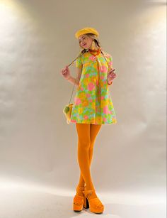 70s Pose Reference, 60s Dolly Fashion, 1960s Casual Outfits, Orange Fruit Outfit, Rollerskating Outfit Ideas, 70s Funky Fashion, Colored Tights Outfit 60s, Orange And Red Outfit, Dorky Outfits