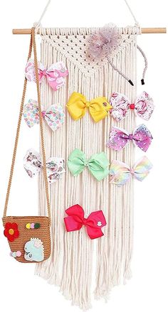 a wall hanging with many different bows on it