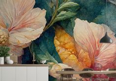 a wall mural with flowers on it in a dining room or kitchen area, and two chairs at the table