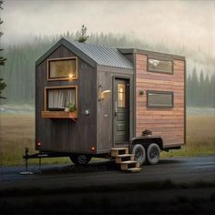 a tiny house is parked on the road