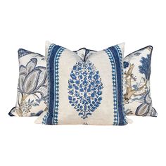 two pillows with blue and white designs on them