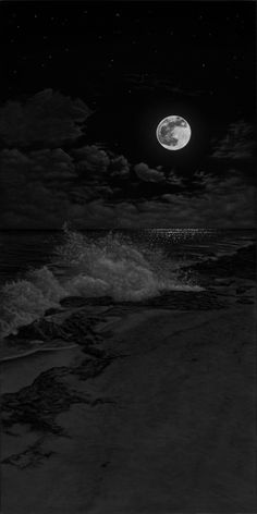 black and white photograph of the moon over the ocean with waves crashing in front of it