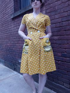 1950s Princess Peggy House Dress. This sweet little dress is a lovely mustard color , buttons at the waist and has an all over polka dot print. The pockets are so cute with  hand painted mixer and tomato cans. Bust - 36" Waist- 34" Nape of neck to hem - 23" Polka Dot Dress With Pockets And Short Sleeves, Polka Dot Short Sleeve Dress With Pockets, Vintage Polka Dot Dress With Buttons, Retro Yellow Dresses With Buttons, Retro Yellow Dress With Buttons, 60s House, Troy Ny, Nape Of Neck, Vintage Inspiration