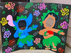 two cartoon characters painted on black paper with flowers and leaves around them, sitting in front of a house