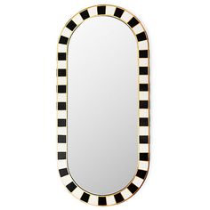 an oval mirror with black and white stripes on it's sides, against a white background