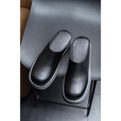 Step into luxury and style with our Opulent LuxeLeather Business Beach Slippers. Crafted with genuine cow leather and pigskin lining, these brogue slippers exude sophistication. The slip-on design and rubber outsole provide comfort and ease, while the 5.5cm heel adds a touch of elegance. Elevate your footwear collection with these opulent slippers today. Experience the epitome of luxury and style with our Opulent LuxeLeather Business Beach Slippers. Crafted with genuine cow leather and pigskin lining, these brogue slippers exude sophistication. Slip into comfort and ease with the slip-on design and rubber outsole, while the 5.5cm heel adds a touch of elegance. Elevate your footwear collection with these opulent slippers today. Indulge in the ultimate luxury and style with our Opulent LuxeL Modern Slip-on Slides With Leather Sole, Comfortable Business Slip-ons With Leather Sole, Leather Mules With Rubber Sole For Business, Leather Slip-ons With Textured Sole And Flat Heel, Leather Slip-ons With Textured Sole, Slip-on Plain Toe Casual Mules, Black Leather Slippers With Branded Insole, Slip-on Mules With Leather Sole And Plain Toe, Casual Slip-on Plain Toe Mules