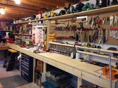 a workbench filled with lots of tools