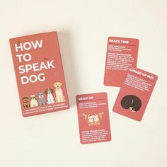 the card game how to speak dog is shown with four cards in front of it