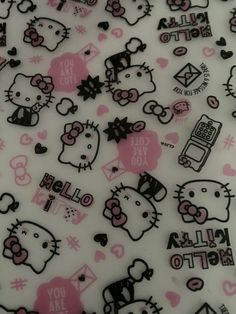 hello kitty wallpaper with pink and black designs on white paper, including the words hello kitty