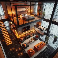 an aerial view of a living room and bedroom from the top floor to the second floor