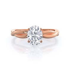 A modern twist on a simple solitaire that rises up to the center stone in a criss crossing pattern Minimal Engagement Ring, Sparkly Ring, Solitaire Diamond Ring, Gorgeous Engagement Ring, Simple Engagement Rings, Classic Engagement Rings, Emerald Engagement, Solitaire Diamond, Emerald Engagement Ring