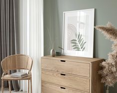 a wooden dresser sitting next to a window