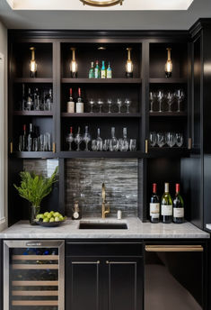 a kitchen with wine glasses and bottles on the shelves above the sink, along with a potted plant